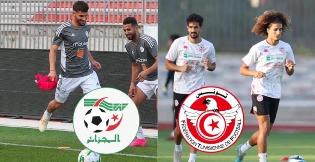 Joueurs de football algériens et tunisiens lors d'un entraînement.