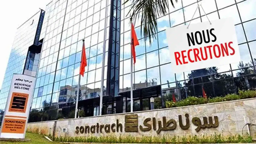 Bâtiment de Sonatrach avec panneau de recrutement.