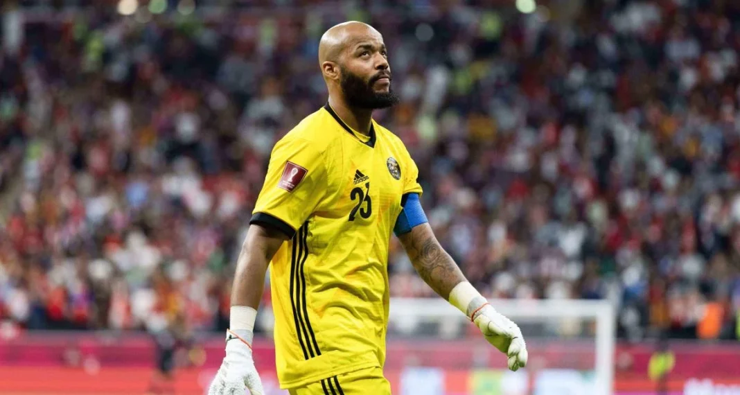 Rais M’Bolhi en tenue de gardien de but lors d’un match.
