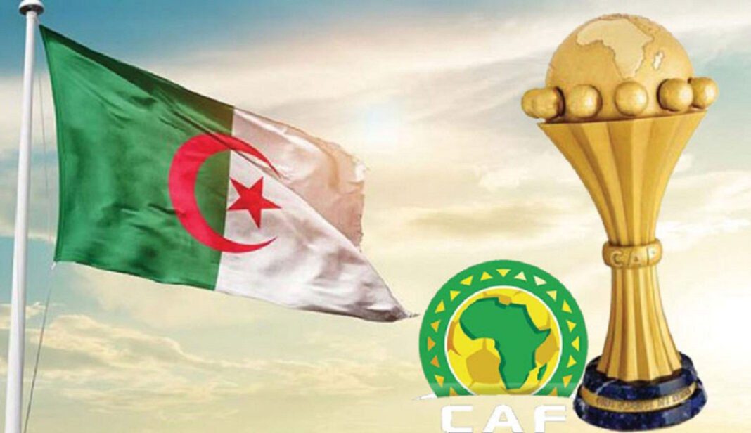 Drapeau de l'Algérie avec trophée de la CAN 2024.