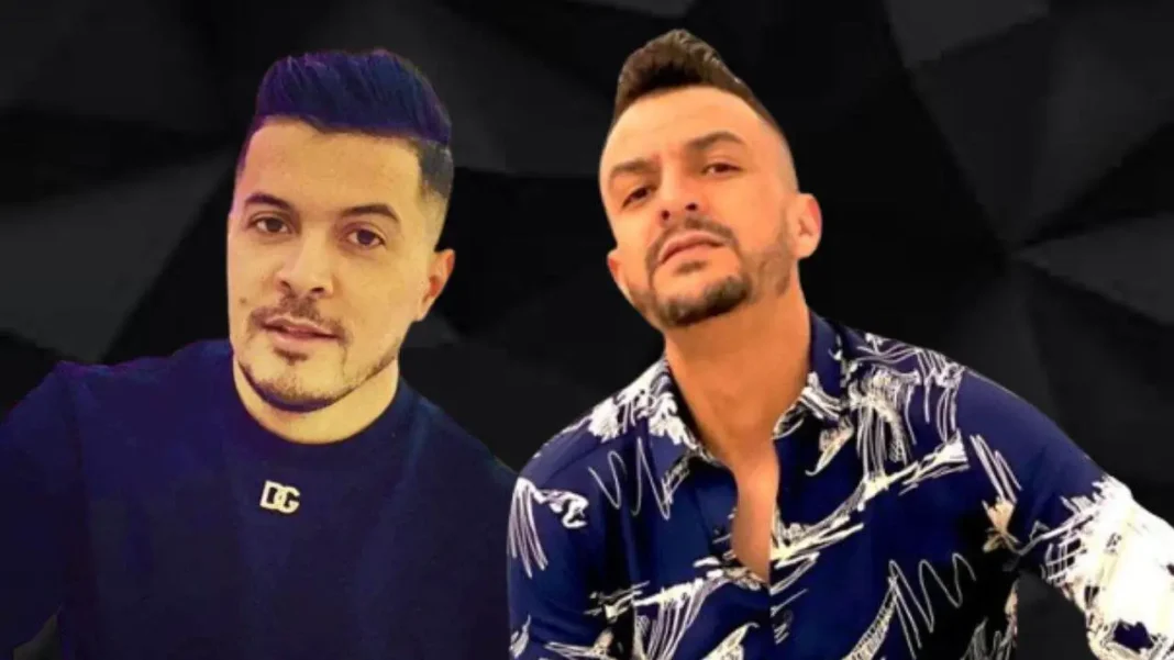 Deux hommes posant pour une photo, expression sérieuse.