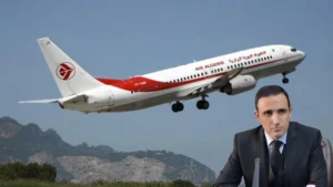 Avion Air Algérie en vol avec un homme en costume en premier plan.