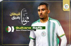 Guitane Rafik, nouveau talent de l'équipe d'Algérie, en maillot blanc et vert.