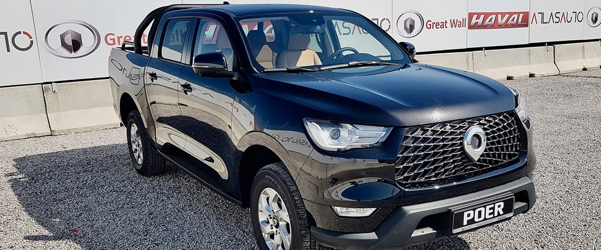 Voiture SUV Great Wall noire exposée lors d'un salon automobile en Algérie.