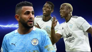 Riyad Mahrez et Pogba lors d'un match de football intense.