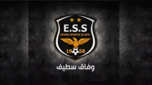 L'ES Sétif s'offre une recrue camerounaise de taille! Un défi aux allures de revanche... Logo de l'ES Sétif avec un aigle et étoiles.