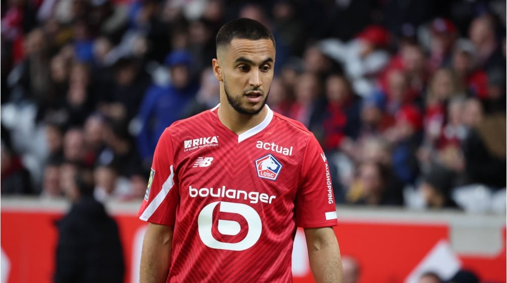 Adam Ounas en action avec le maillot de Lille lors d'un match.