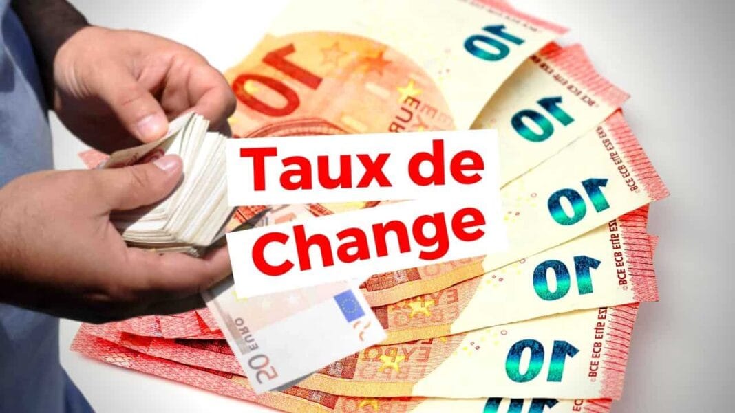 Billets de banque euro et texte Taux de Change en français.