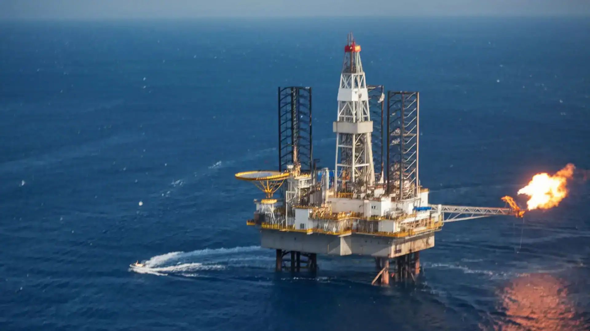 Plateforme pétrolière en mer avec flamme de forage en Algérie.