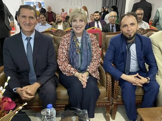 Groupe de professionnels en génétique lors d'une conférence en Algérie.