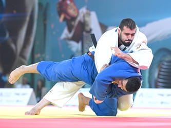 Athlète algérien en judo lors des Jeux Olympiques de Paris 2024.