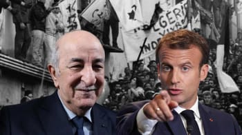 Deux hommes politiques lors d'une manifestation avec drapeaux et pancartes.