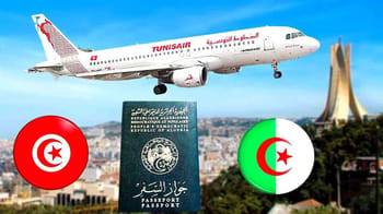 Avion Tunisair en vol au-dessus d'Alger avec monuments en arrière-plan.