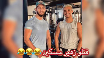 Rifka et Zouhair Bahaouin souriants dans une salle de sport.