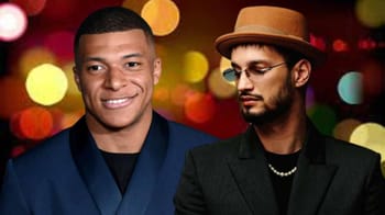Soolking et Kylian Mbappé lors d'une interview.