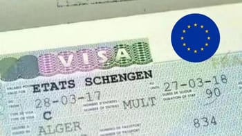 Visa Schengen pour Algériens avec drapeau européen.