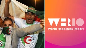 Homme souriant avec drapeau algérien lors d'une célébration.