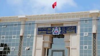 Bâtiment officiel avec drapeau marocain et enseigne du ministère de la Culture.