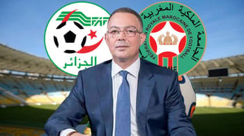 Fawzi Lakjaa devant un stade avec logos de la CAF et de la FRMF.