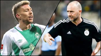 Djamel Belmadi et Mitchell Weiser lors d'un match de football.