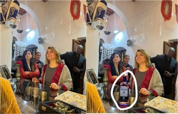 Ministre libyen des Affaires étrangères avec bouteille d'alcool en main.