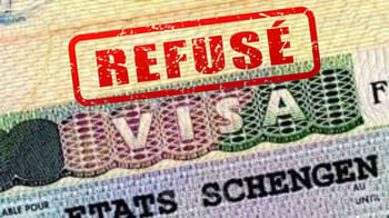 Visa Schengen refusé avec stamp rouge "Refusé".