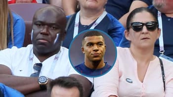 Wilfried Mbappé et une femme lors d'un événement sportif ou officiel.