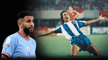 Mahrez en action lors d'un match de football, célébrant un but.