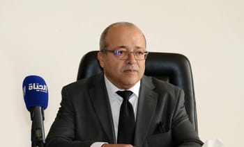Mohamed Bouslimani lors d'une conférence de presse officielle.