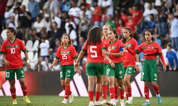Joueuses marocaines de football lors d'un match international.
