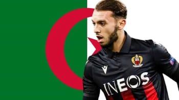 Amine Gouiri, joueur de football algérien, en pleine action sur le terrain.