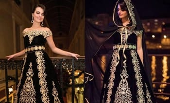 Femme portant une gandoura algérienne traditionnelle avec broderies dorées.