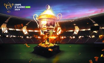 Trophée de la Coupe d’Algérie 2024 dans un stade en soirée.