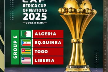 Trophée de la Coupe d'Afrique des Nations 2025 avec drapeaux.