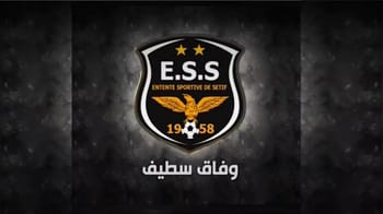 Logo de l'ES Sétif avec un aigle et étoiles.