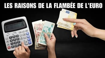 Main tenant des euros et dinars algériens avec calculatrice.