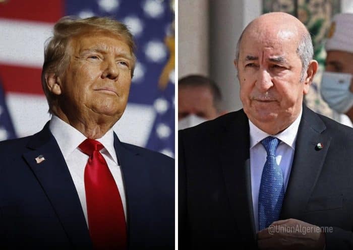 Donald Trump et un homme en costume lors d'un événement public.