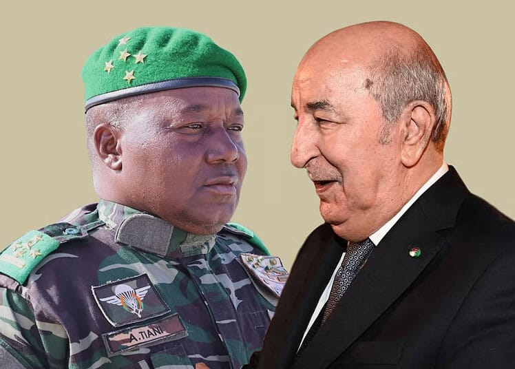 Deux hommes en discussion, un militaire et un diplomate, lors d'une rencontre officielle.