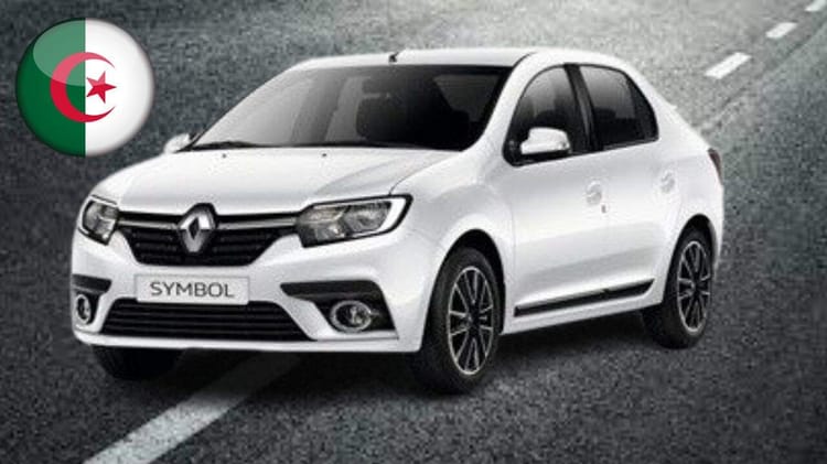 Voiture Renault symbol blanche sur route en Algérie avec drapeau algérien.