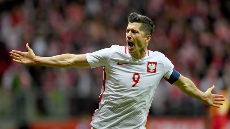 Robert Lewandowski en pleine célébration lors d'un match de Coupe du Monde.