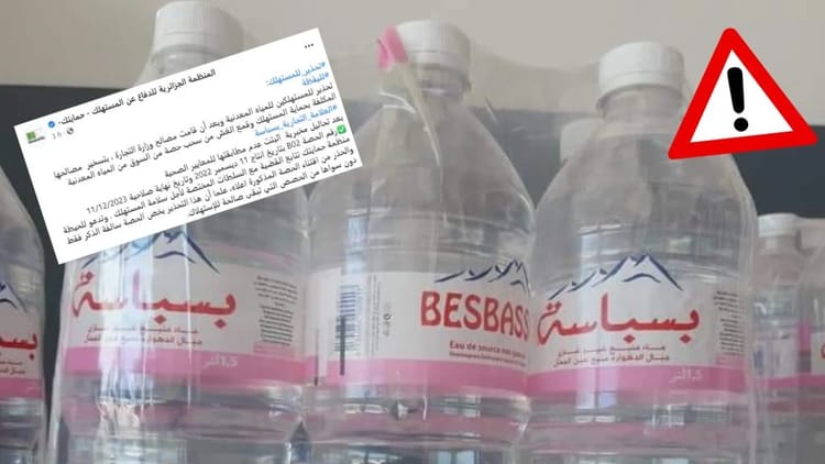 Bouteilles d'eau Besbassa avec symbole d'alerte rouge.