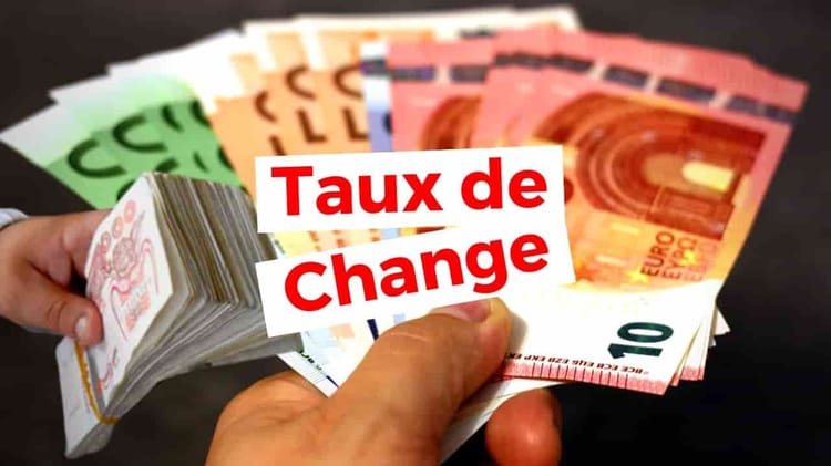 Billets de banque algériens et euros, taux de change du dinar.