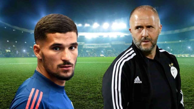 Houssem Aouar et son entraîneur sur le terrain de football.
