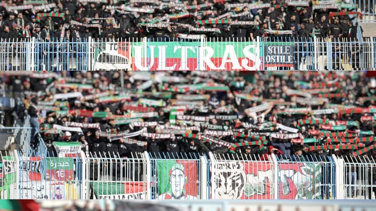 Sanctions officielles : 7 clubs algériens de la Ligue 1 Mobilis en difficulté Supporters du club algérien avec drapeaux et écharpes lors d'un match.