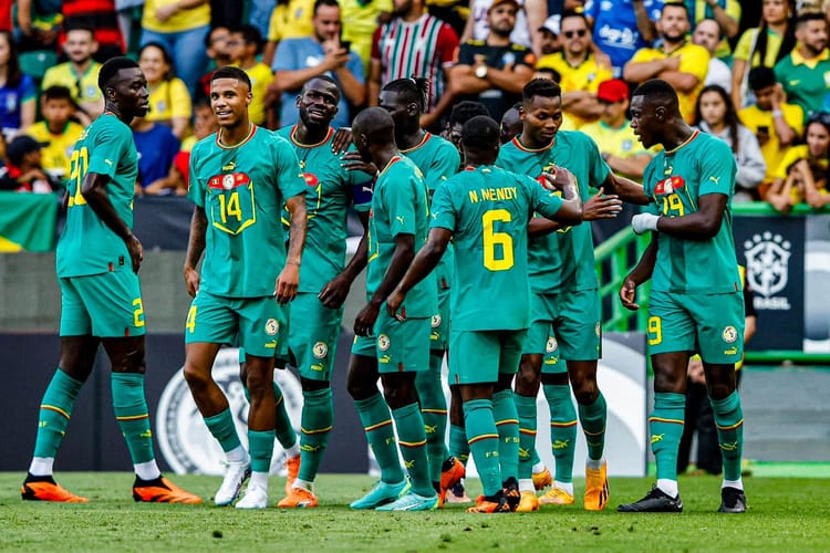 Joueurs des Lions du Sénégal lors d'un match contre l'Algérie.