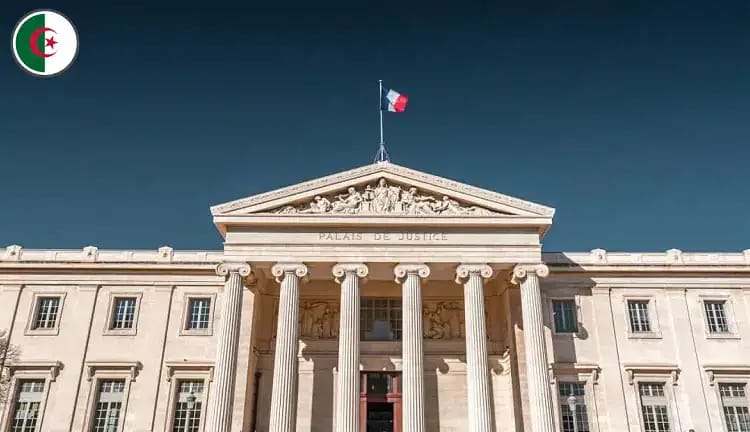 Victoire judiciaire : un Algérien obtient son titre de séjour ! Façade d'un bâtiment gouvernemental avec drapeau français.