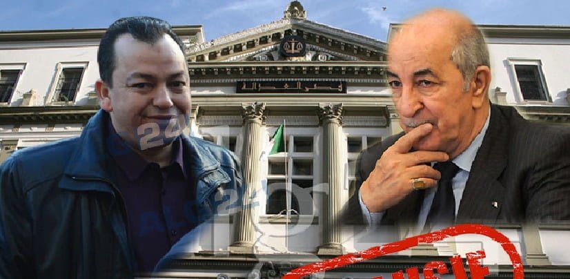 10 ans de prison pour Al-Boushi et un ancien maire… Image de deux hommes devant un bâtiment officiel, procès en cours.